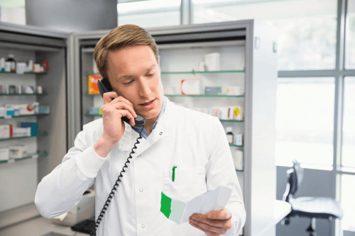 Happy pharmacist on the phone_test (002)-1